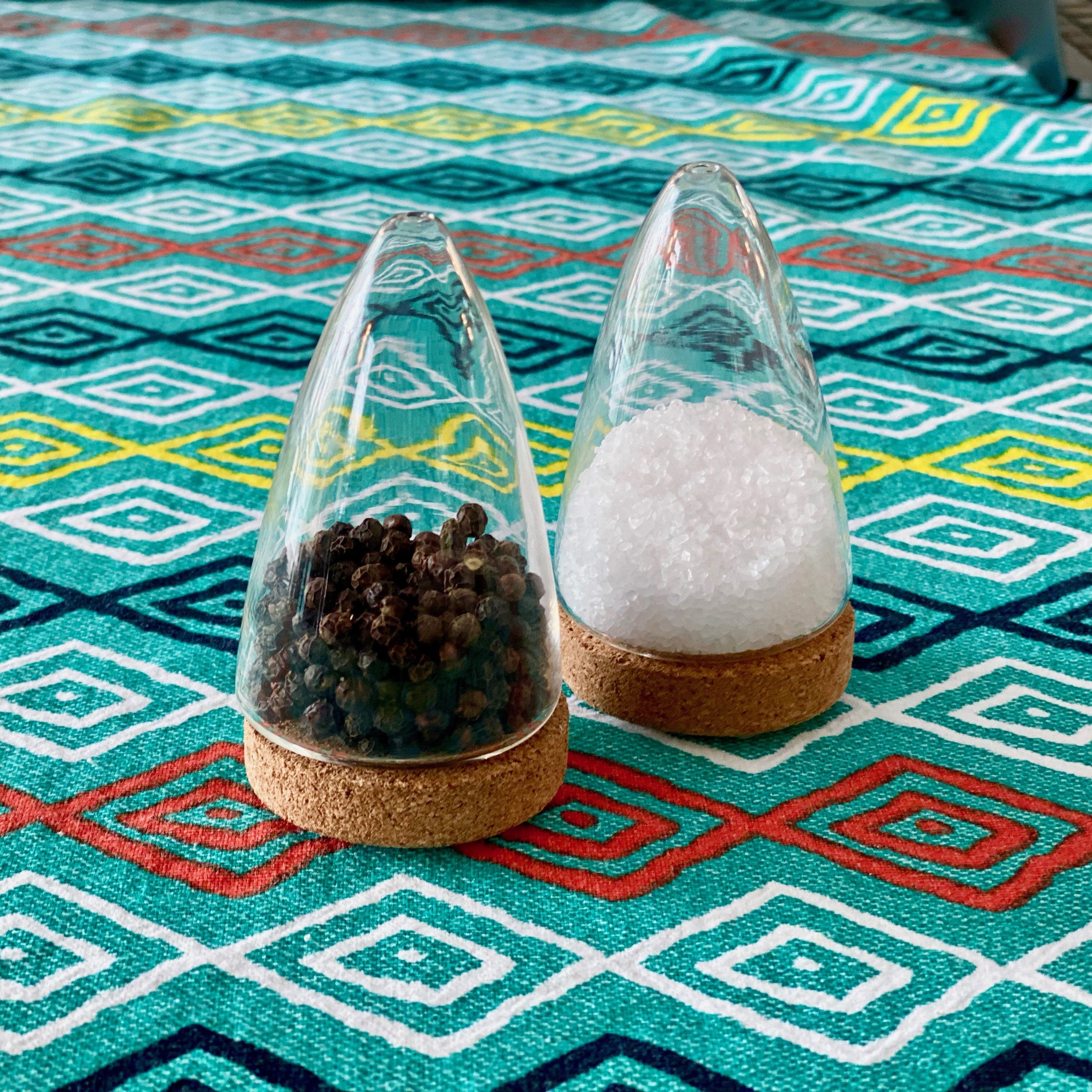Puik design salt and pepper shakers on a table